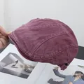 Detail view of burgundy corduroy beret hat with adjustable strap and vintage texture - Adjustable / Burgundy