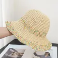Close-up of beige crochet sun hat featuring colorful woven details and soft texture - Adjustable / Beige