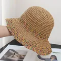 Detailed view of hollow crochet straw hat with colorful woven texture on the wide brim - Adjustable / Khaki