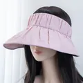 Detail of pink wide brim sun visor with elastic pleated fabric and inner UV lining - Adjustable / Pink