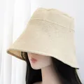 Detailed close-up of beige woven wide-brim straw hat with dense sun-protective texture - M (56-58cm) / Light Beige