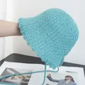 Detail of light blue crochet sun hat featuring hollow knit texture and wavy lace edge - M / Lake Blue