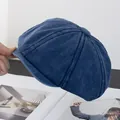 Detailed view of the dark blue washed cotton newsboy hat with stitched panel design - M(56-58cm) / Navy Blue