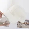 Close-up of white plush faux lamb wool baseball cap showing thick fuzzy texture - Adjustable / Cream