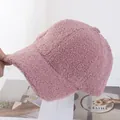 Close-up of soft pink fuzzy teddy fleece fabric texture on a warm winter baseball cap - Adjustable / Pink