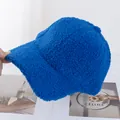 Close-up of soft Klein blue lamb wool baseball cap with fluffy texture and curved brim - Adjustable / Sapphire Blue