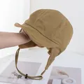 Detailed close-up of warm khaki aviator hat featuring plush fleece lining and ear flaps - Khaki