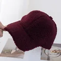 Close-up of burgundy lamb wool baseball cap with thick textured fleece and curved brim - Adjustable / Burgundy