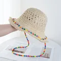 Detailed close-up of a crochet straw hat with colorful beads and matching wind rope strap - Adjustable / Beige