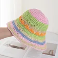 Detailed view of handmade colorful woven straw sun hat with breathable knit texture - Pink & Green