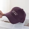 Detail of burgundy cotton baseball cap with white bear embroidery and creative art crew text - Regular (54-59CM) / Purple
