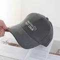 Detail of dark grey corduroy baseball cap with white bear embroidery on fabric - Regular (54-59CM) / Corduroy / Dark Gray