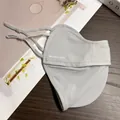 Detailed view of grey UPF50+ face mask featuring breathable mesh and adjustable ear loops - Light Gray