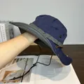 Detailed view of dark blue wide-brim sun hat with adjustable cord and grey webbing - M(56-58cm) / Navy Blue