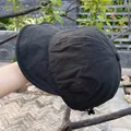 Detail view of the black nylon sun hat with multi-row stitching and adjustable drawstring - Adjustable / Black