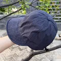Detail of dark blue nylon hat with adjustable elastic drawstring buckle and fine stitching - Adjustable / Navy Blue