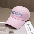 Detail of pink cotton baseball cap with white 3D SPORT embroidery and stitched brim - Adjustable / Pink