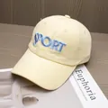 Detailed embroidery of SPORT lettering on a cream cotton twill vintage baseball cap - Adjustable / Yellow