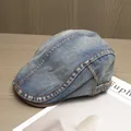 Detailed view of vintage denim cap with contrast stitching and side metal buckle detail - Adjustable / Dark Blue