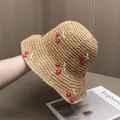 Detail of hand-woven straw hat featuring vibrant red cherry embroidery for summer travel - Adjustable / Khaki Hat Red Cherry