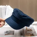 Nahaufnahme der dunkelblauen Schiebermütze mit Leinenstruktur und festem Schirm - Verstellbar / Marineblau