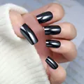 Close-up of glossy black mirror-finish long square press-on nails on a hand - Box Packaging / Black