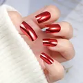 Close-up of metallic red mirror finish square fake nails on a soft sweater sleeve background - Box Packaging / Burgundy