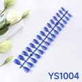 Glossy royal blue almond press-on nails set displayed with floral props and magazine - Royal Blue (YS1004)