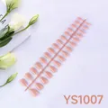 Macro view of 24 pieces nude pink almond press-on nails with glossy finish on plastic strip - Color Box / Nude Pink (YS1007)