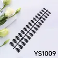 Detail of 24 pieces set of glossy black almond shaped medium press on nails on a tray - Black (YS1009)