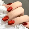 Cat eye press-on nails in deep ruby red with glitter shimmer and glossy finish - Red Cat Eye Style (SGL529)