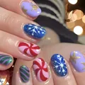 Short Christmas press-on nails set with red and green festive star and snowflake designs - Without Tools
