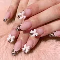 Faux ongles brillants rose léopard avec nœuds 3D blancs et forme d'amande élégante - Style Nœud Léopard Rose (YS410)