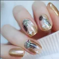 Short square press-on nails with Christmas pine cone design and gold glitter finish - YS400