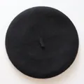 Classic black wool beret for kids with warm thick texture and iconic top tail detail - One Size / Black