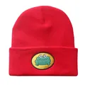 Detailed close-up of a red knitted beanie featuring a green cartoon frog embroidery - Adjustable / Red