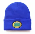 Detailed view of royal blue knitted beanie with cartoon frog embroidered patch - Adjustable / Blue