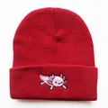 Detailed close-up of pink axolotl embroidery on a dark red ribbed knit beanie hat - Adjustable / Burgundy
