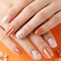 Unghie finte corte quadrate arancioni e bianche con glitter argento e fiori - Ys567 (senza Attrezzi)