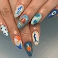 Unghie finte a mandorla stile oceano blu con decorazioni di stelle marine e malocchio - Stile Oceanico (YS840)
