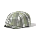 Close-up of green plaid newsboy cap showing woven texture and top button detail - One Size 56-59cm / Green