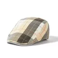 Detailed view of the plaid fabric texture on this classic newsboy flat cap - Adjustable / Khaki