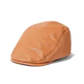Detailed macro view of camel PU leather flat cap showing premium lychee grain texture - Adjustable / Khaki