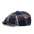 Classic blue and red plaid newsboy cap with octagonal crown and short brim on white background - One Size / Red