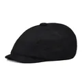 Detail view of the black corduroy fabric texture and stitch on the newsboy flat cap - One Size / Black