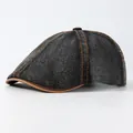 Vintage washed denim newsboy cap in dark grey with orange contrast stitching and faux leather brim - Adjustable / Black