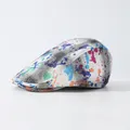 Detail of grey plaid beret hat with colorful paint splatter graffiti art design - Adjustable / Purple Graffiti