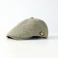 Classic khaki plaid ivy cap with detailed texture and small letter patch on white background - Adjustable / Light Green