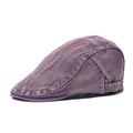 Detail view of washed purple denim newsboy cap featuring adjustable bronze metal buckle - Adjustable / Purple