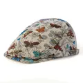 Close-up of butterfly jacquard fabric and metal buckle on retro ivy cap for women - Adjustable / Beige